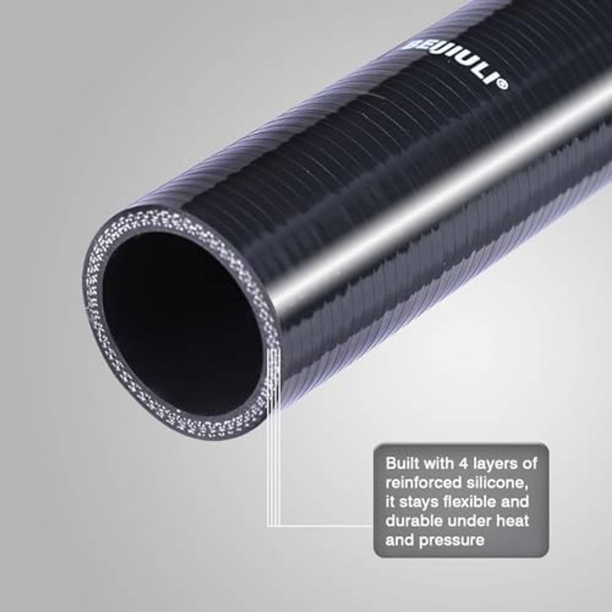Angled view of black silicone coupler hose with silver inner lining.