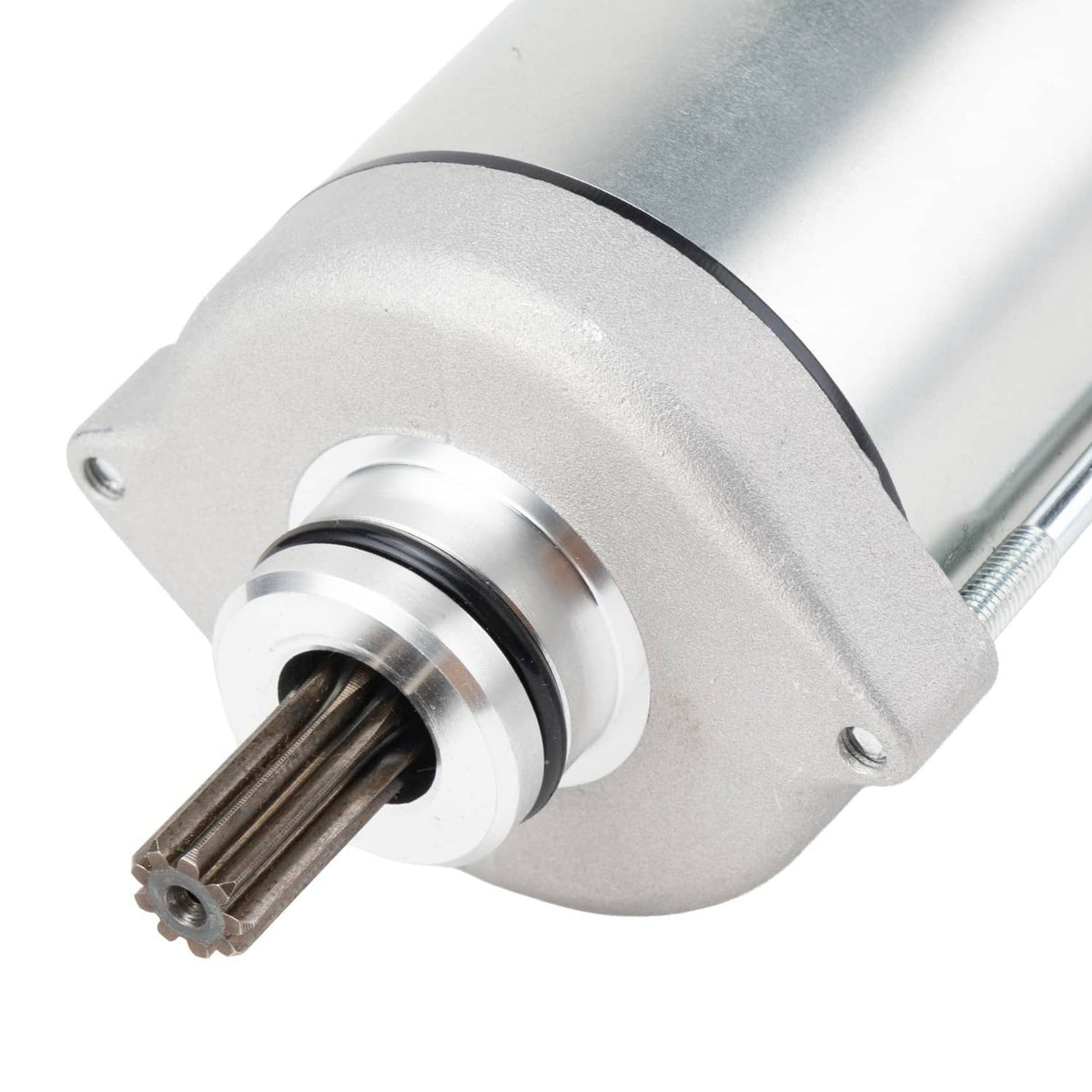 Starter motor close-up showing front end cap and splined drive shaft