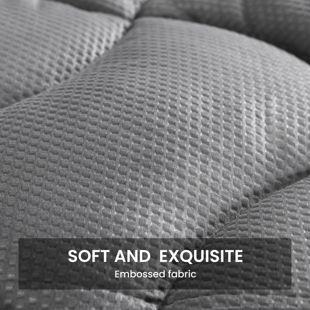 Gray embossed mattress topper fabric surface with soft, cloud-like quilting