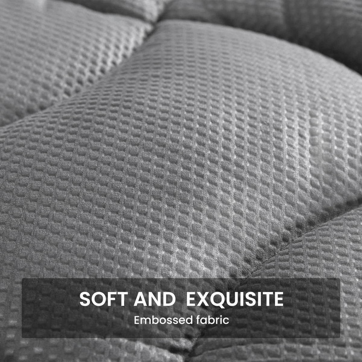 Gray embossed mattress topper fabric surface with soft, cloud-like quilting
