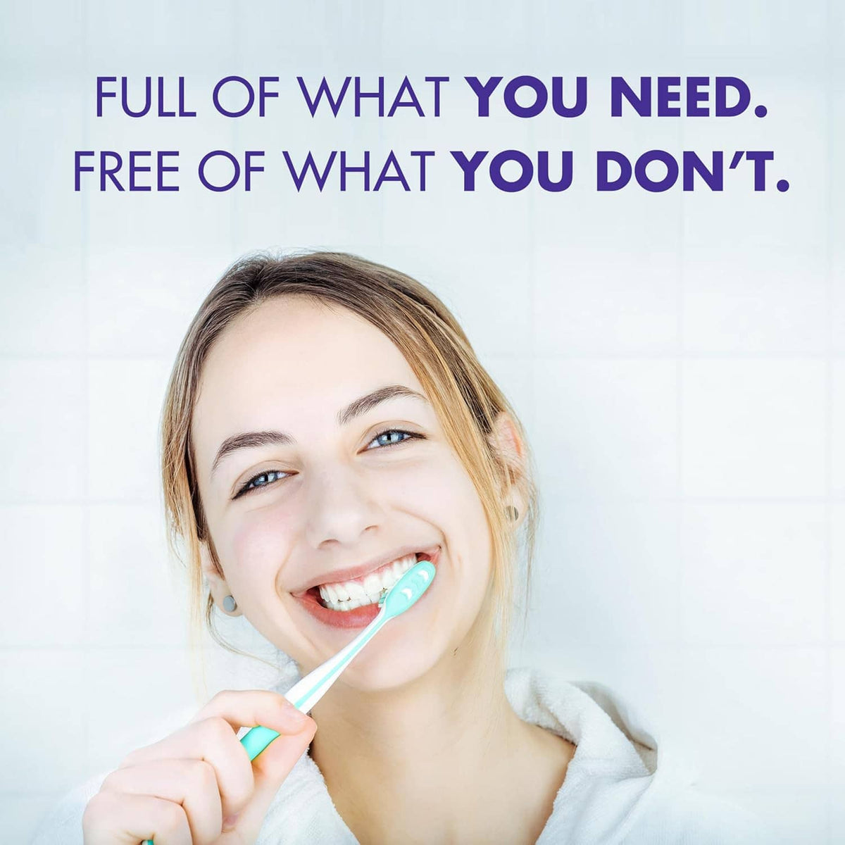 Person smiling while brushing teeth with blue toothpaste gel and toothbrush