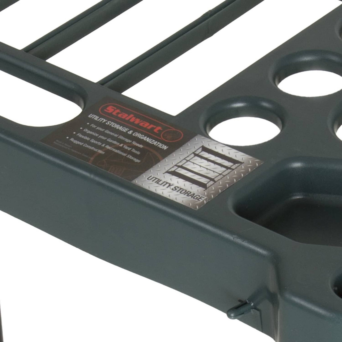 Dark green rack top bar close-up with circular slots and molded information label panel