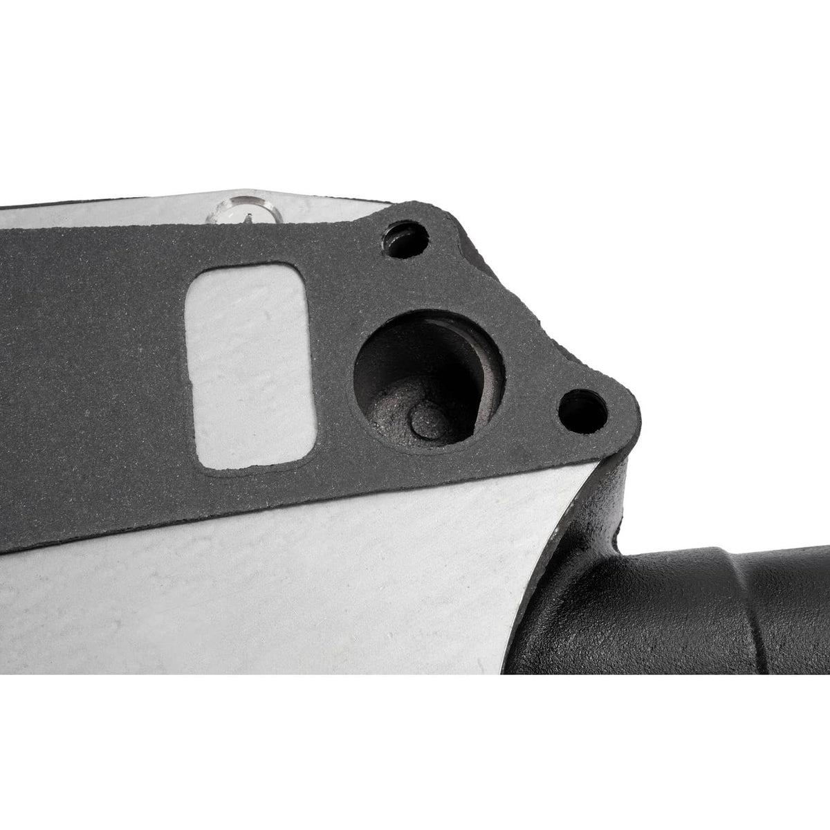 Water pump close-up of black housing casting with rectangular opening and round port