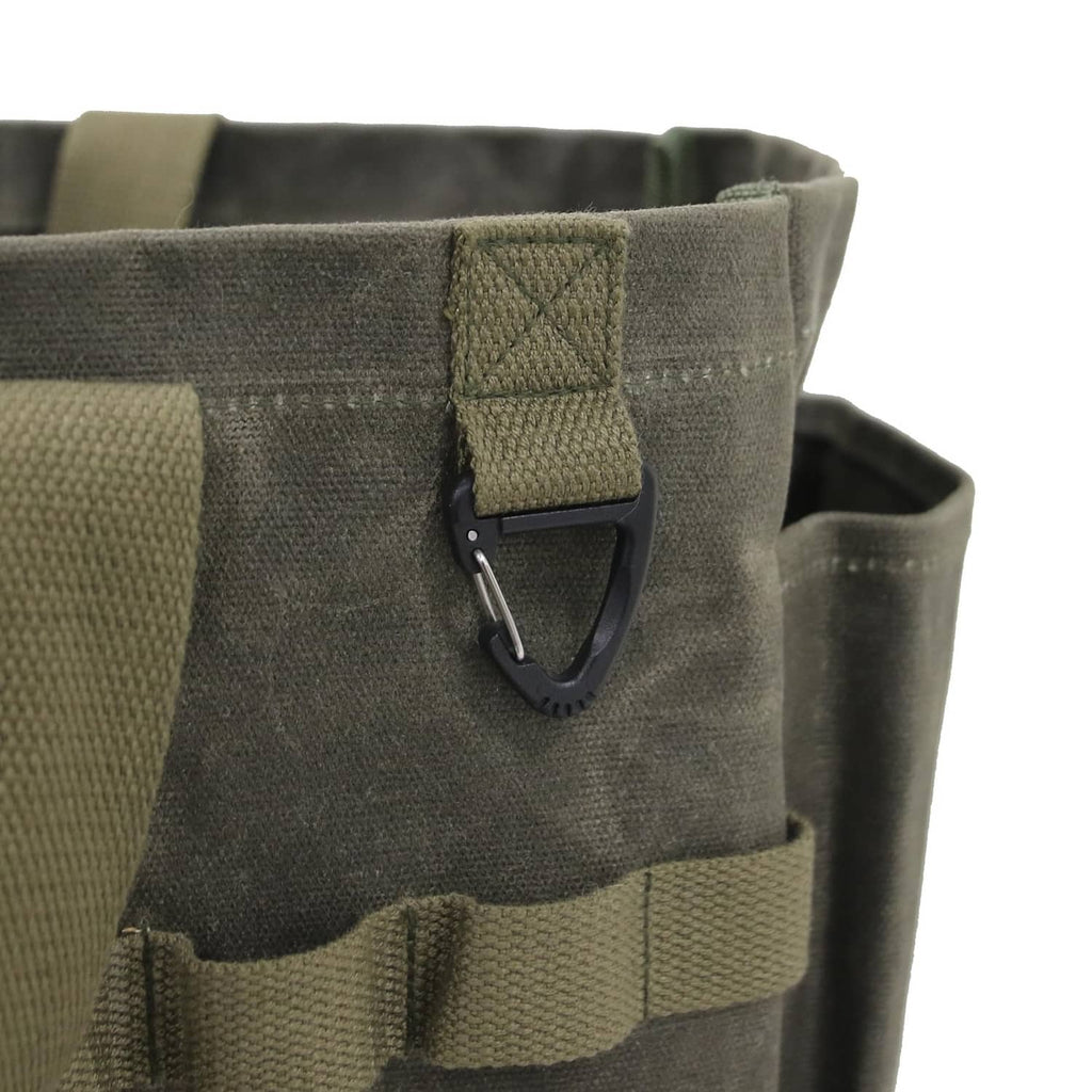 Army green tote pocket with webbing flap and snap buckle closure