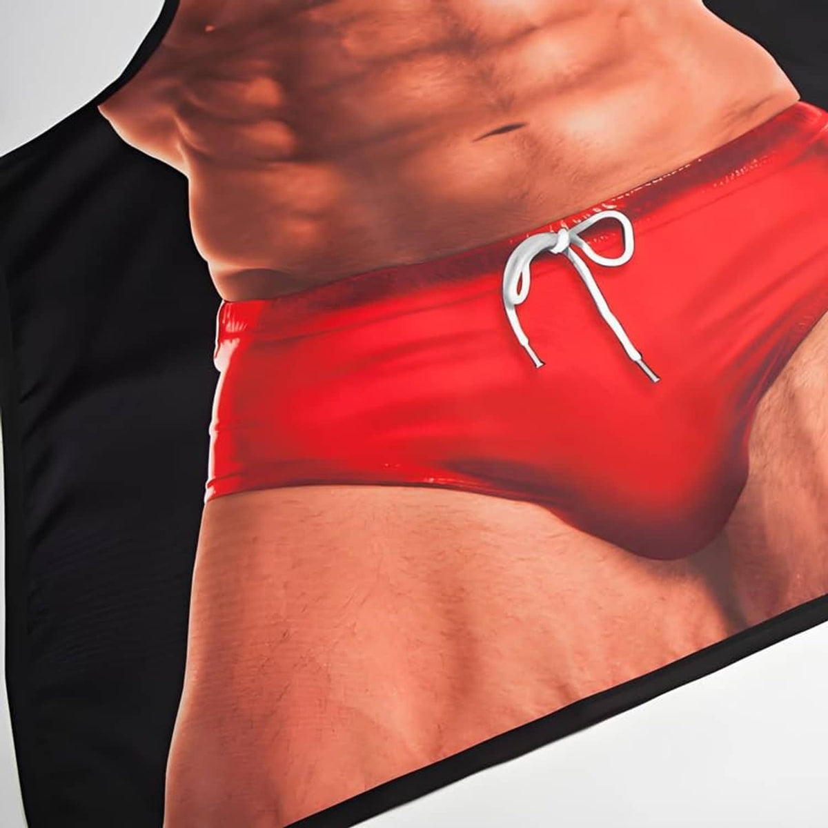 Close-up novelty apron: red shorts graphic with white tie strings and black trim