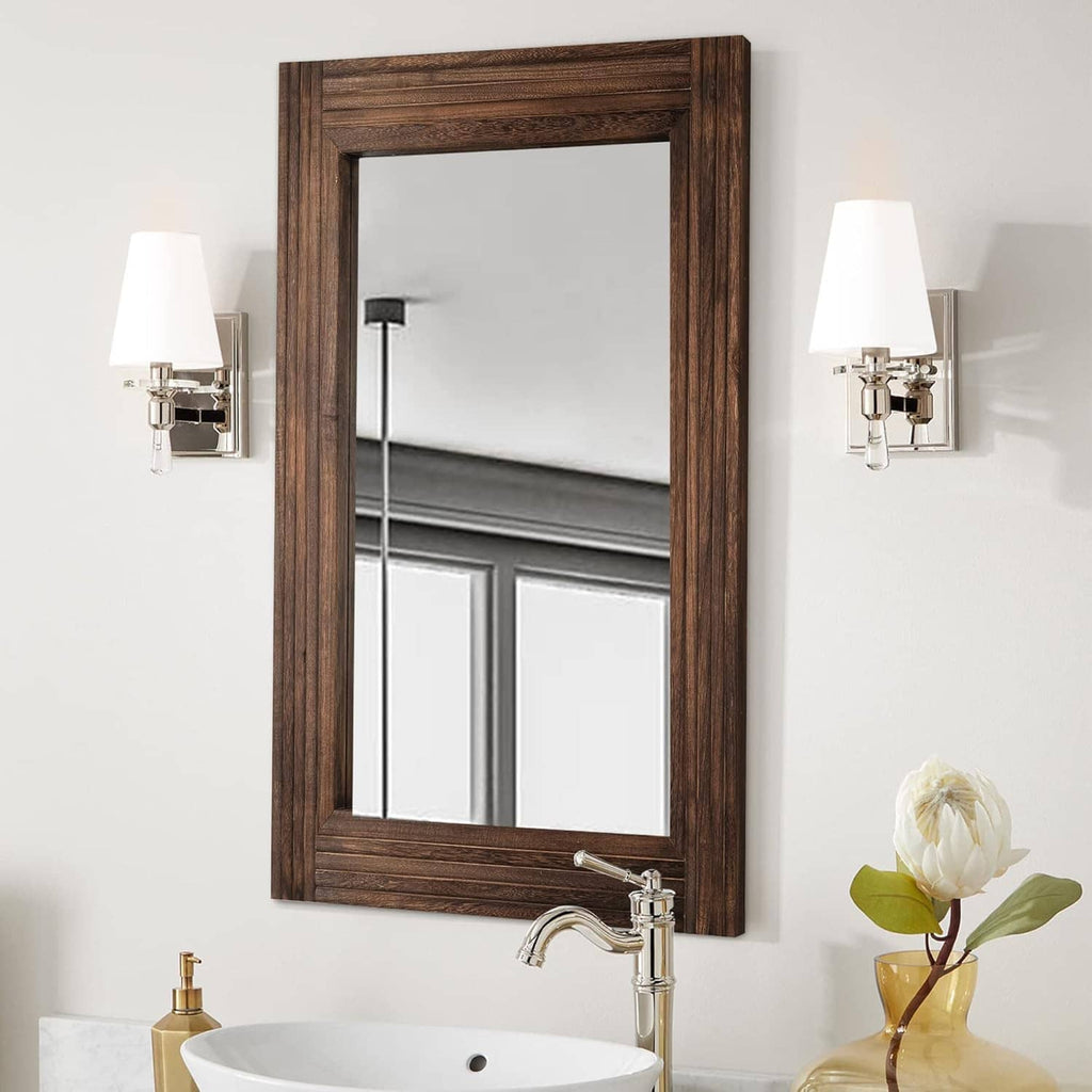Rustic rectangular wooden wall mirror with dark brown frame, mounted above a sink.