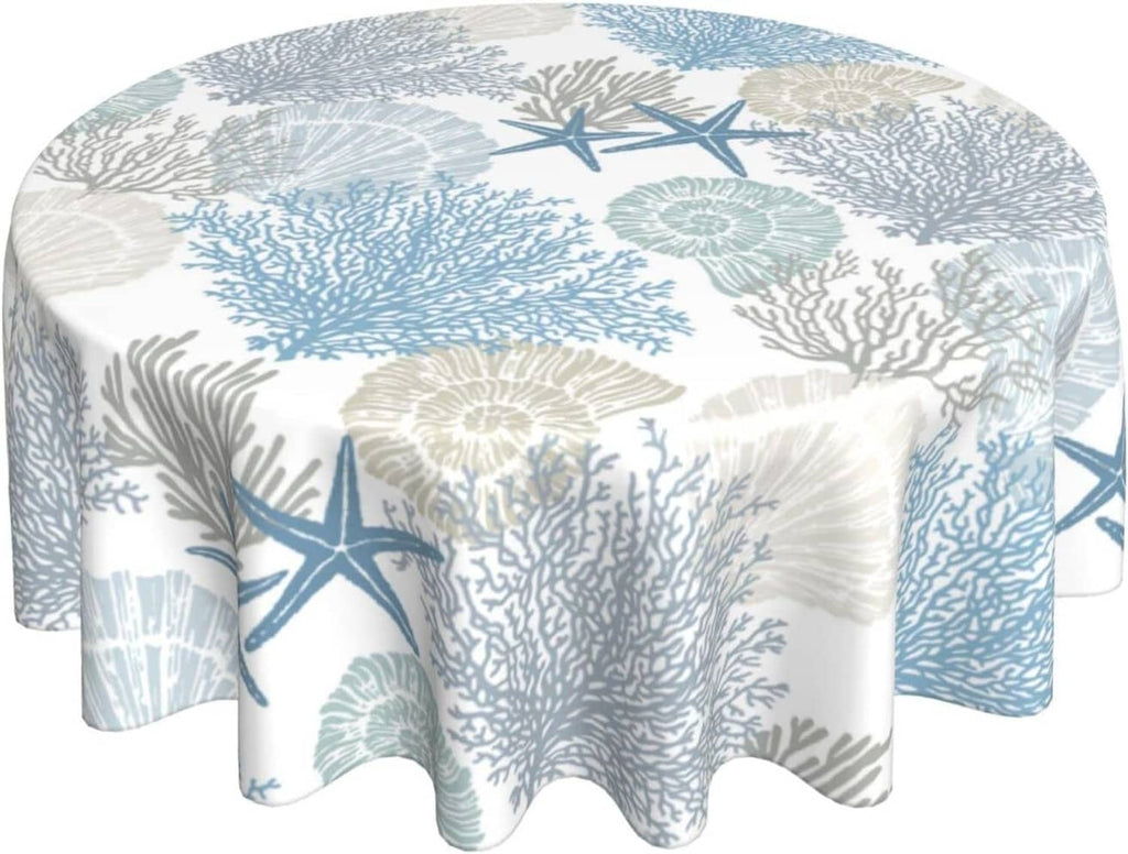 Round nautical tablecloth with blue and beige coral, sea fans, and starfish print