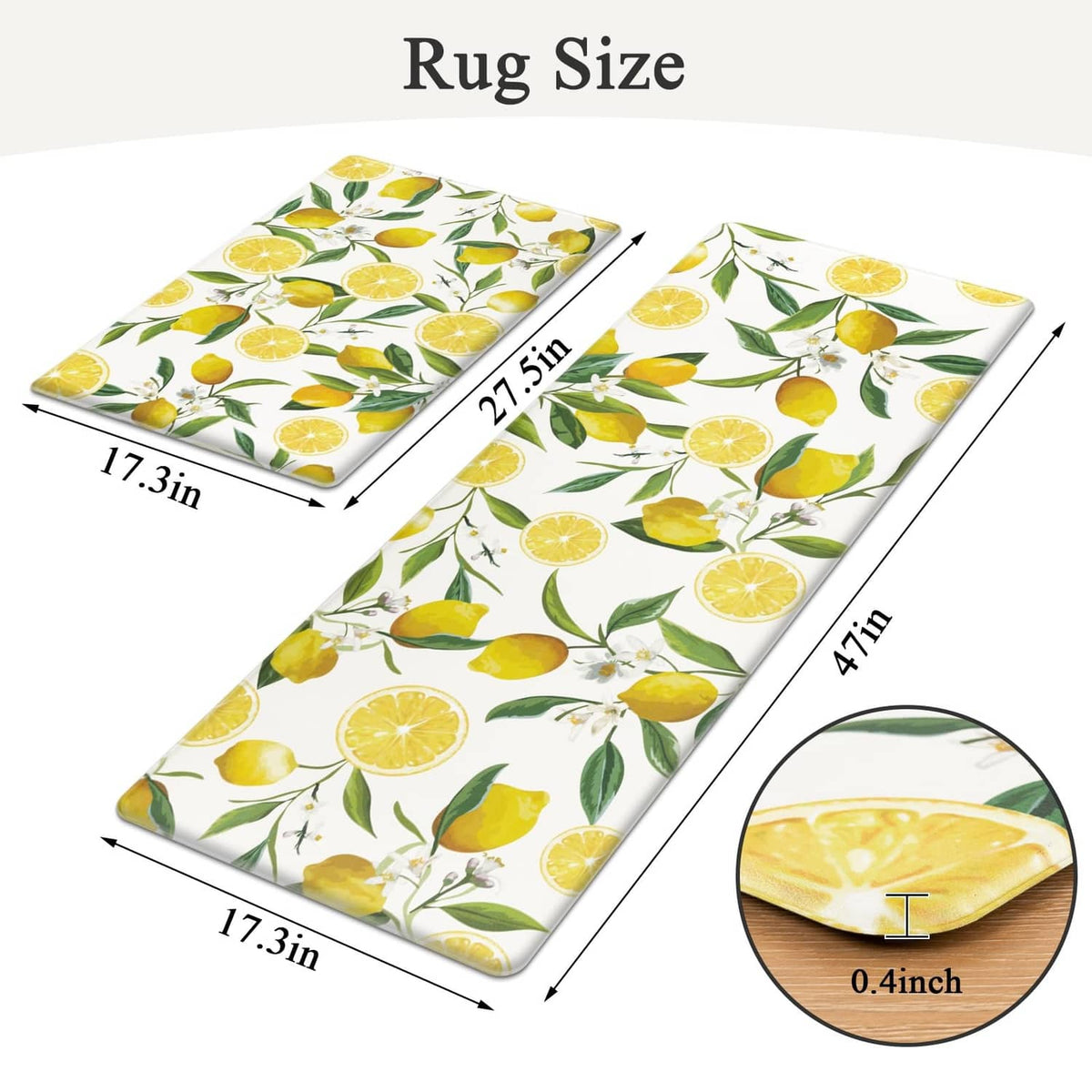 Two white lemon-pattern kitchen rugs laid flat, showing rectangular sizes