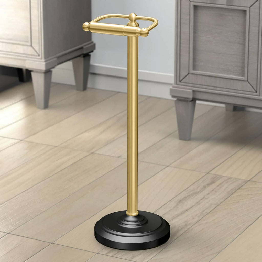 Freestanding toilet paper stand with polished brass post and matte black base