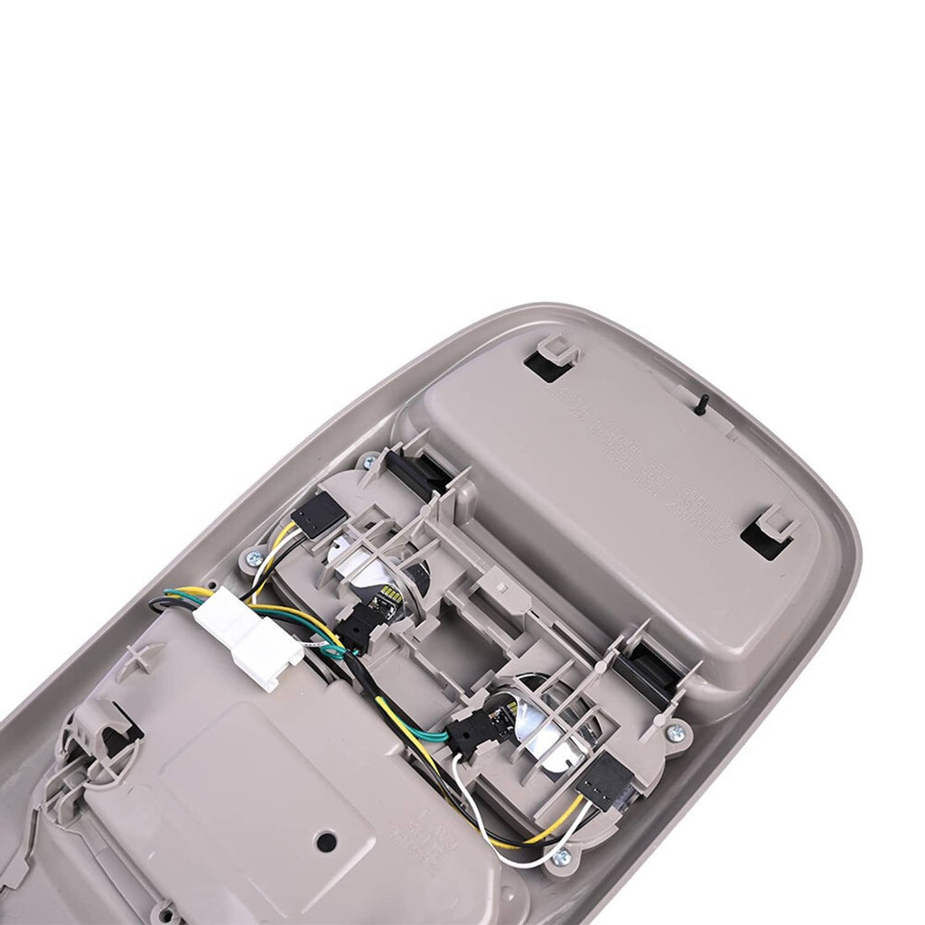 Vehicle overhead console interior with wiring harness and switch components, light gray.