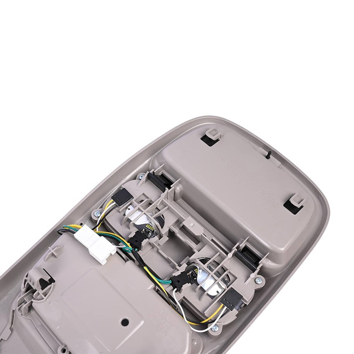 Vehicle overhead console interior with wiring harness and switch components, light gray.