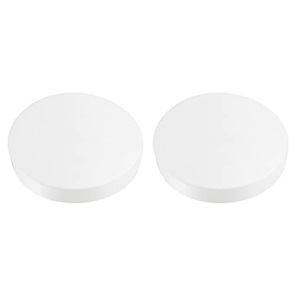 Two white round PVC pipe end cap plugs, flat top design