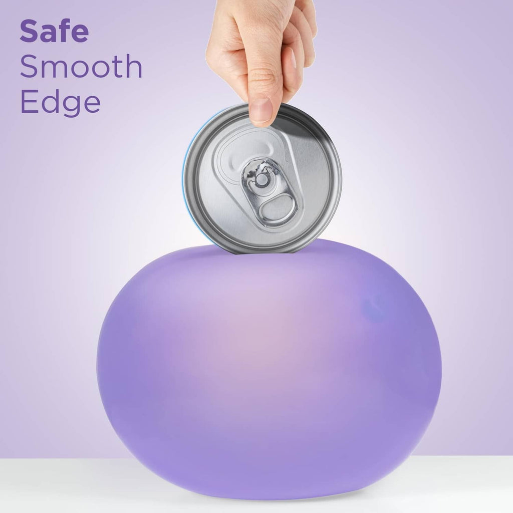 Lilac rechargeable can opener holding a can for a smooth edge