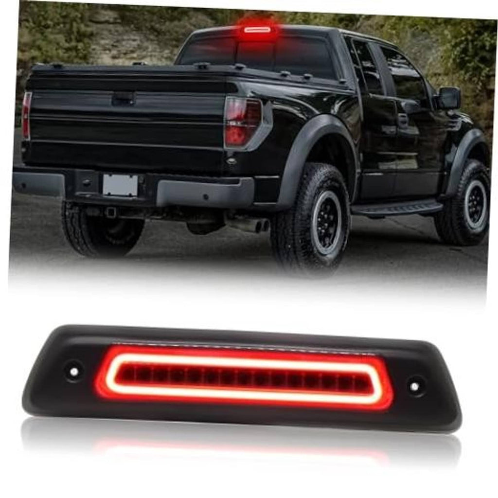 LED third brake light with smoked housing and red LED strip on truck tailgate