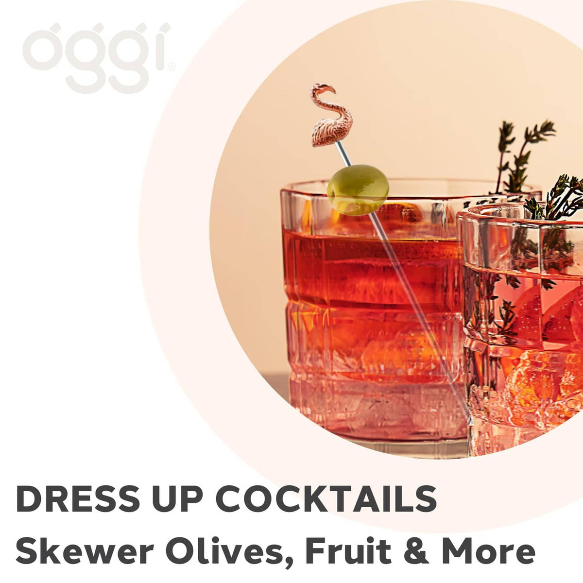 Flamingo cocktail pick with metal skewer on an olive-topped drink