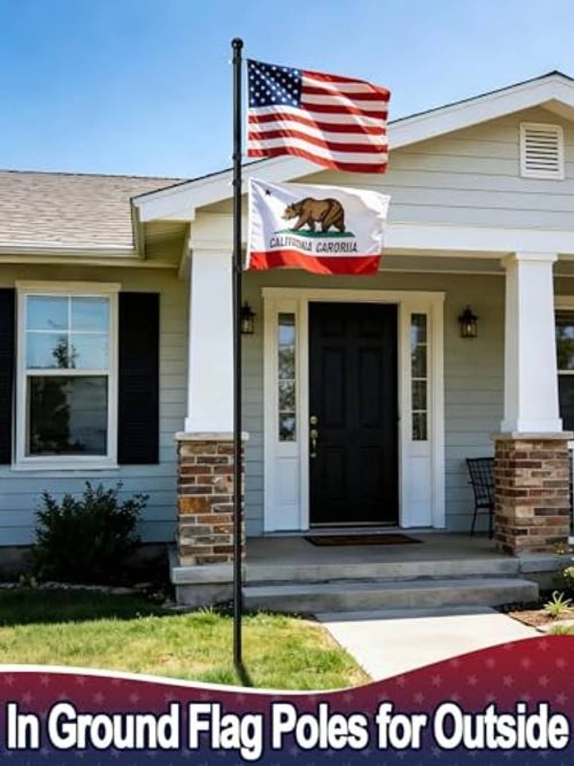 Black 10 ft in-ground flag pole holding two flags at a home front yard.