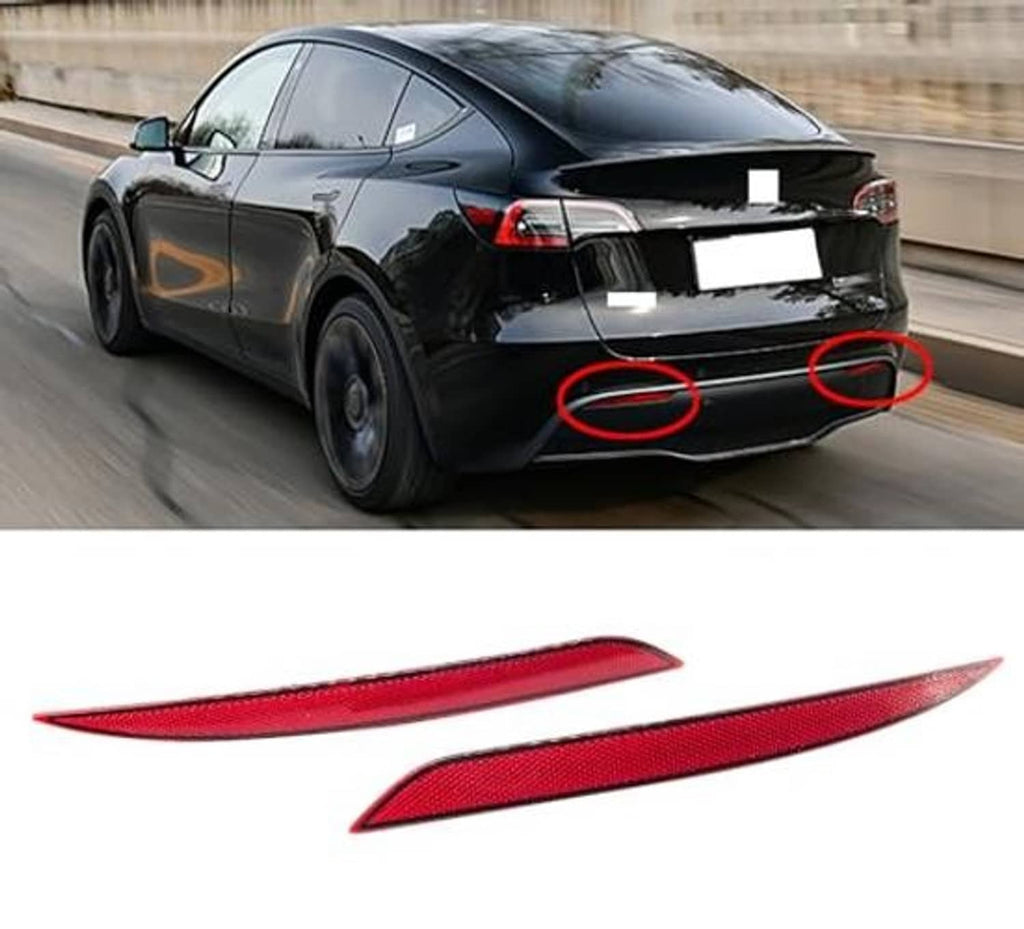 Rear of Tesla Model Y showing red marker light reflectors on bumper