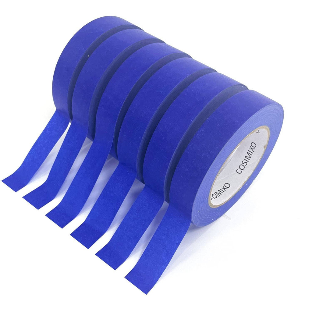 Blue masking tape roll with several loose strips extending outward.