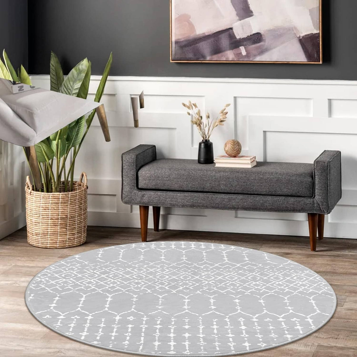 Grey round rug with white Moroccan trellis pattern, centered circular design and border