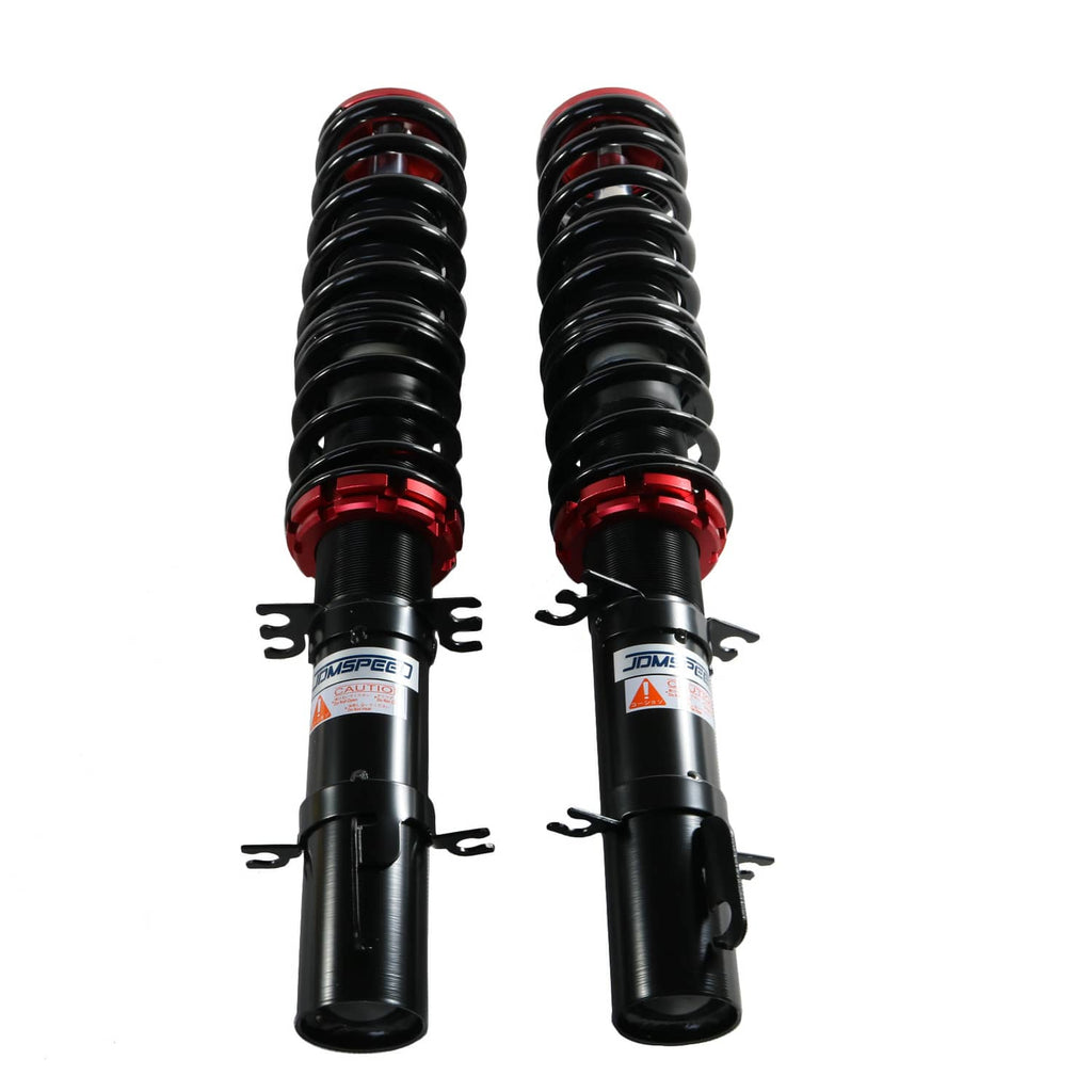 Coilover shocks with black bodies, red spring collars, and threaded black coil springs