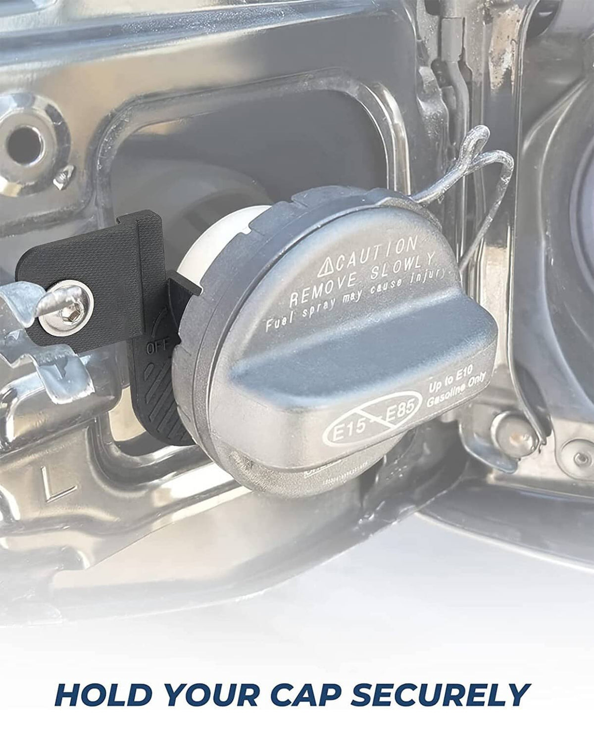 Black gas cap holder trim installed over fuel cap area