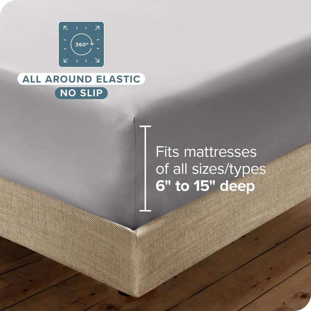 Light grey fitted sheet with all-around elastic for deep 6–15 inch mattresses