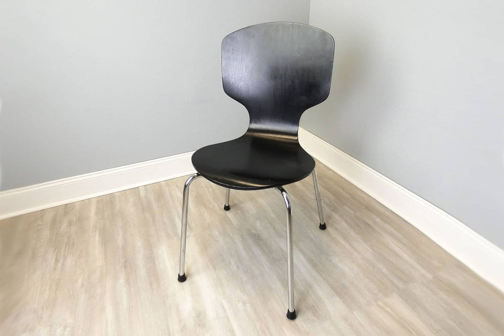 Chair legs with black rubber foot tips underneath