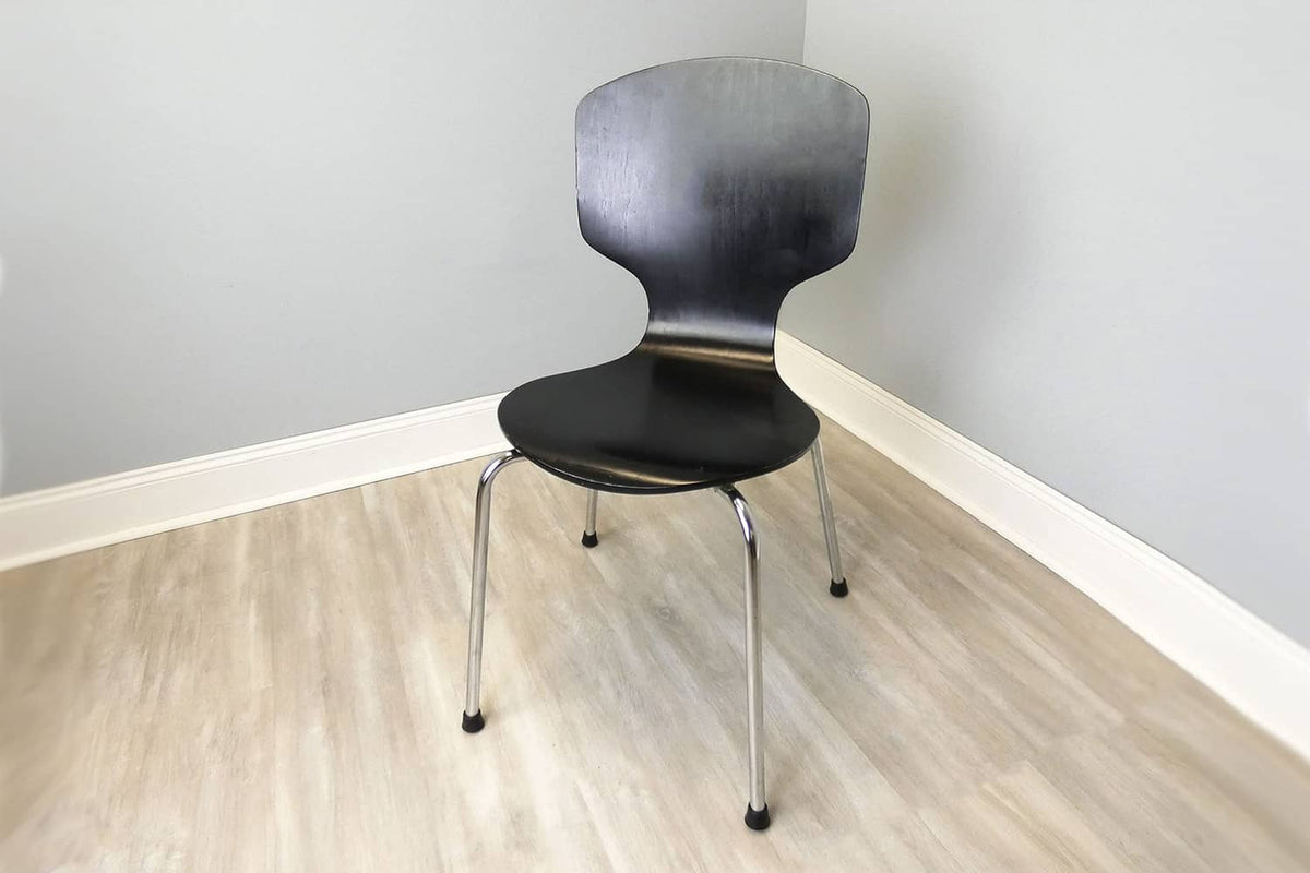 Chair legs with black rubber foot tips underneath