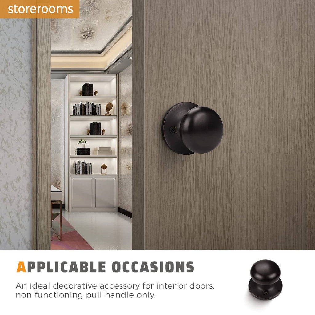 Matte black dummy door knob mounted on a door panel