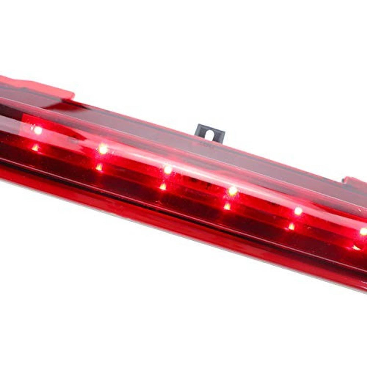 Close-up LED third brake light lens with red illumination and row of LED points