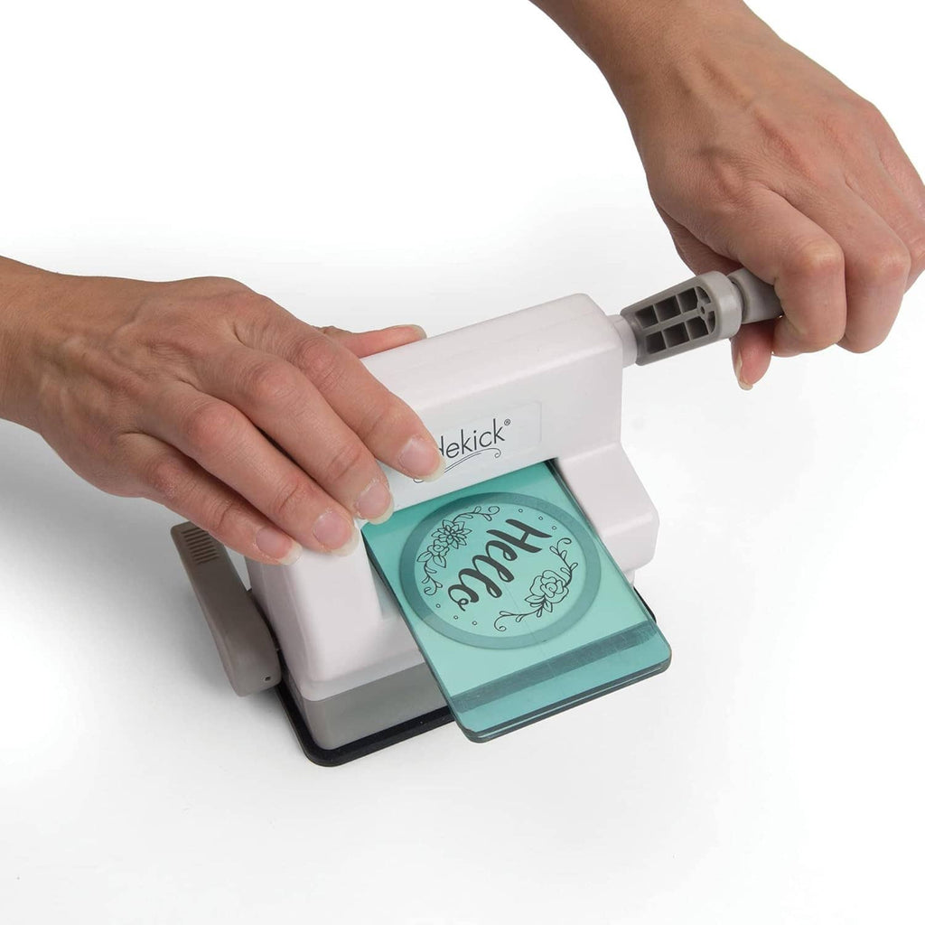 Sidekick portable die cutting and embossing machine with teal cutting plate