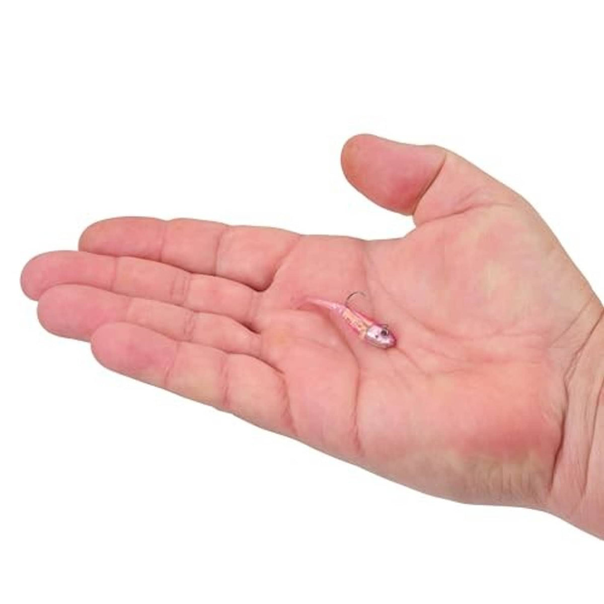 Soft plastic fishing lure in hand, small pink translucent bait with hook and jig