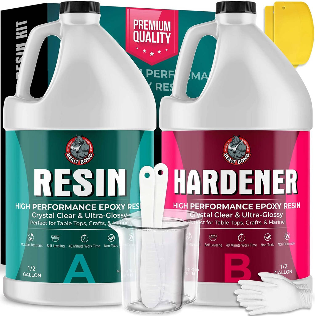 Epoxy resin hardener kit with two white bottles, measuring cups, and gloves.