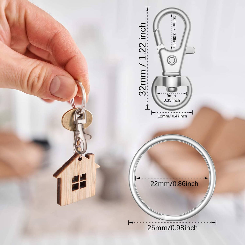 Metal lobster claw key ring clasp with carabiner-style latch, held on a key