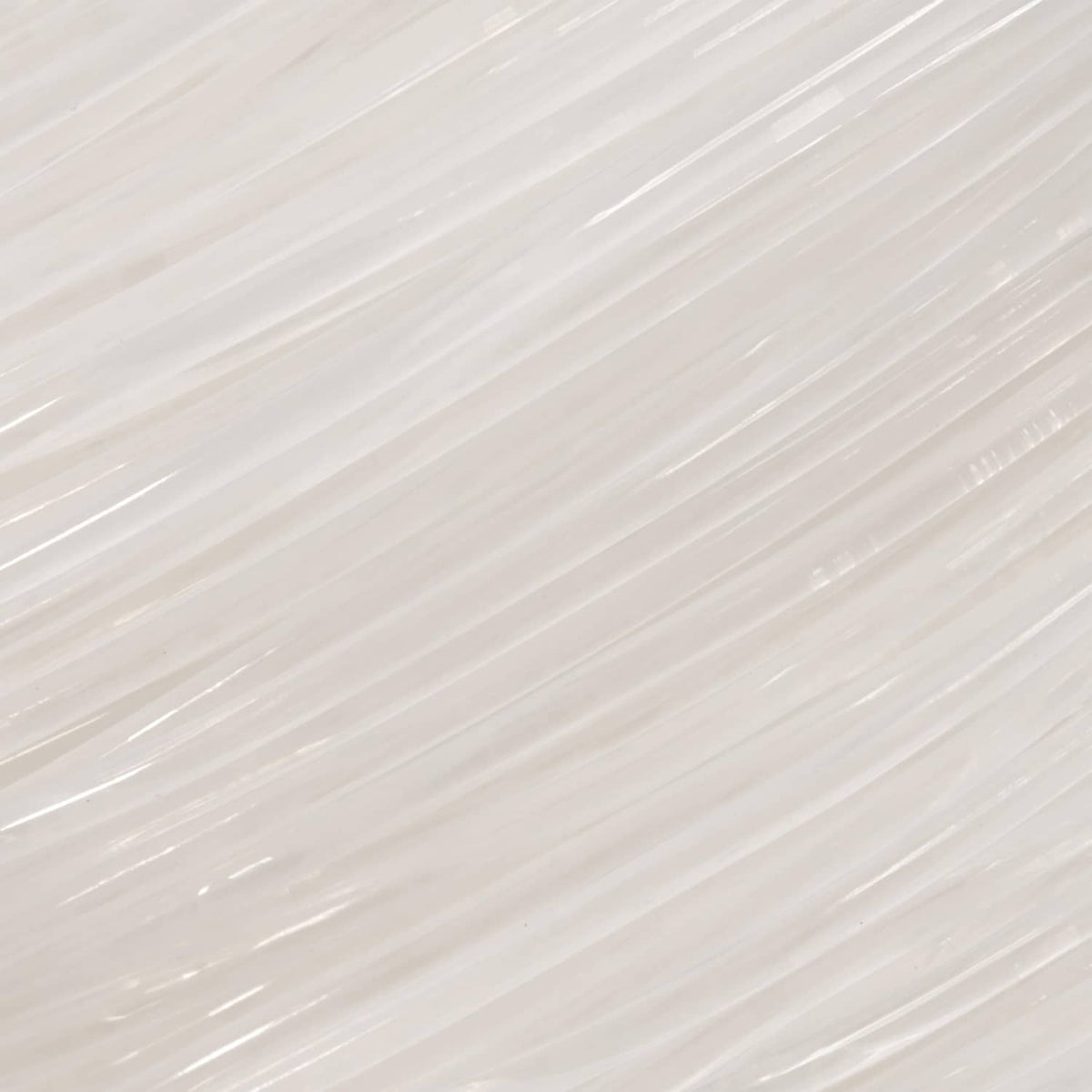 Close-up of clear elastic beading cord strands