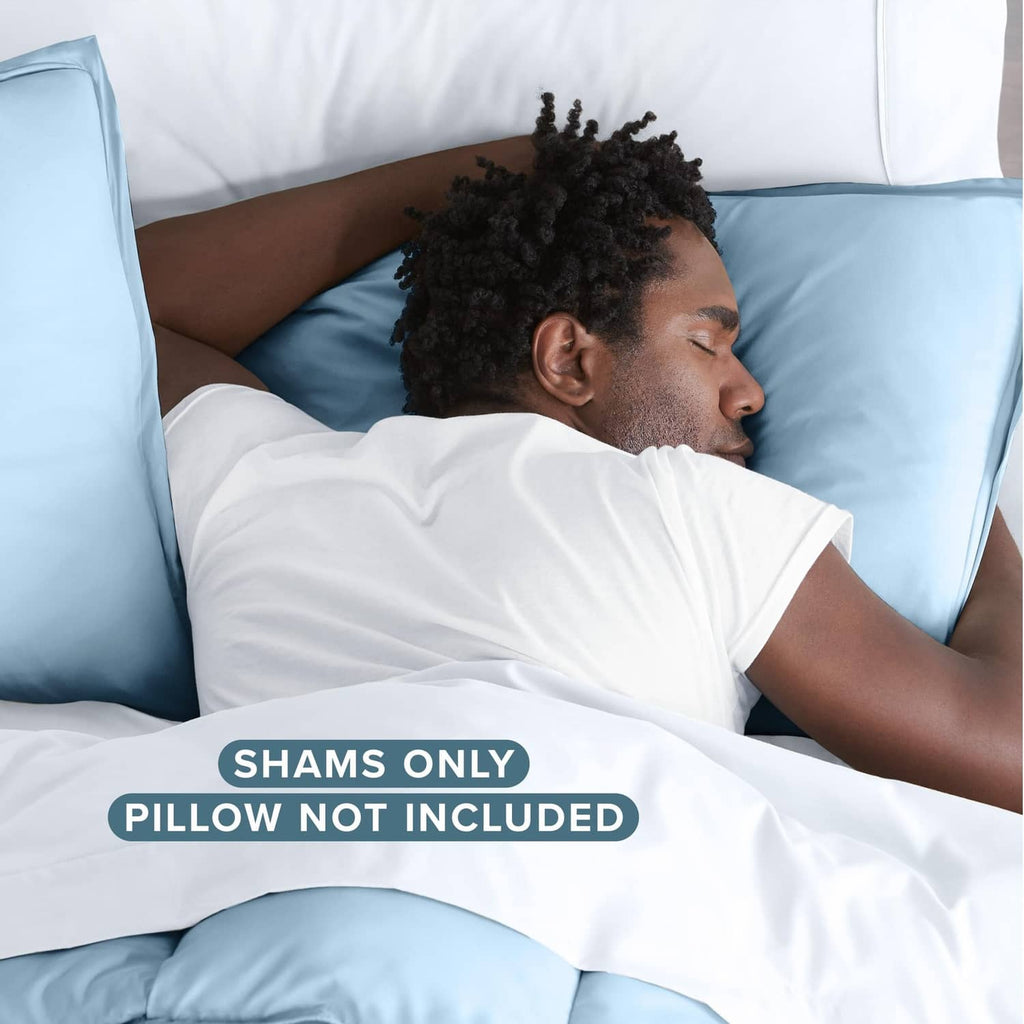 Light blue microfiber pillow sham on bed, envelope-closed cover (shams only).