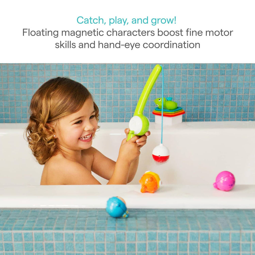 Munchkin® magnetic bath fishing rod with floating bobbers, held by a child