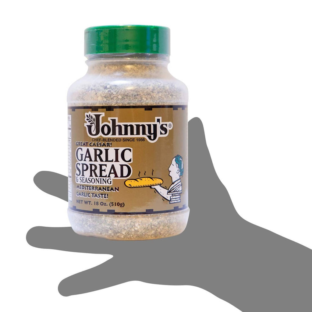 Garlic spread seasoning jar with green cap and front label for garlic seasoning