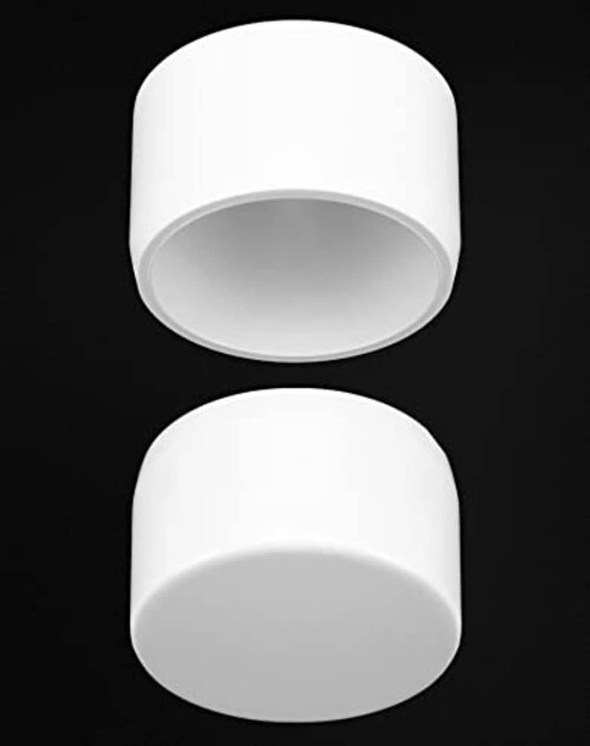 White 1-1/4 in PVC pipe end caps, open end and interior detail