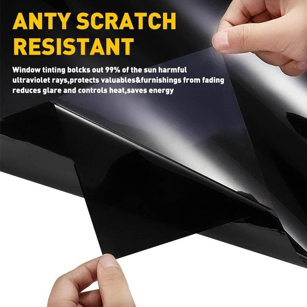 Black window tint film held by hands, anti-scratch surface finish