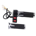 Electric throttle grip set with black textured handles and illuminated red switch panel