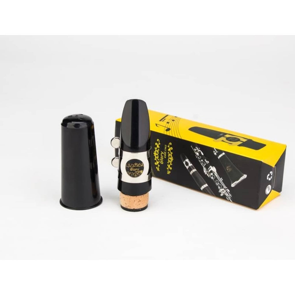 Clarinet mouthpiece kit with black mouthpiece, ligature, cork reed, and yellow box