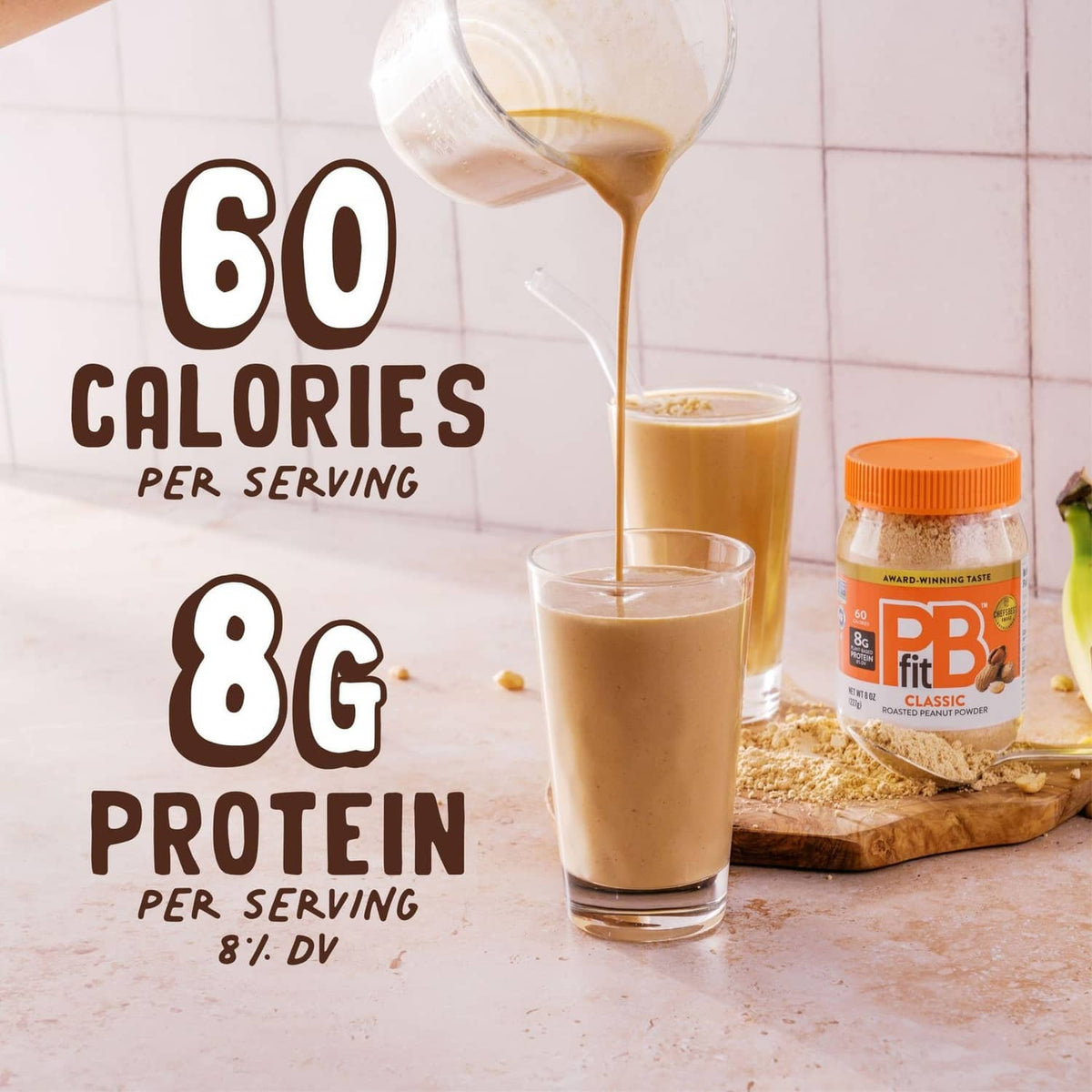 Peanut butter powder jar with three glasses of peanut butter drink