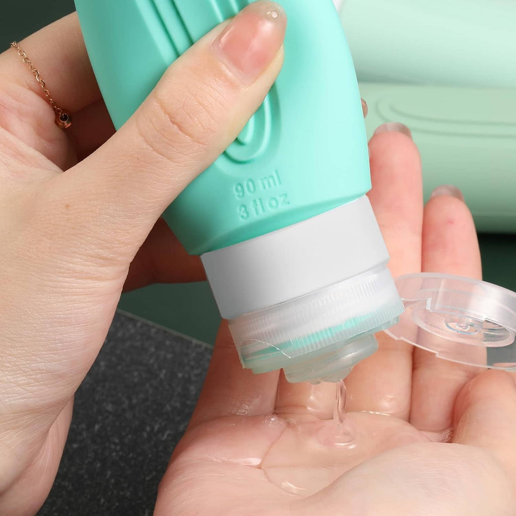 Mint green 90 ml toiletry bottle showing cap seal and clear measuring ring