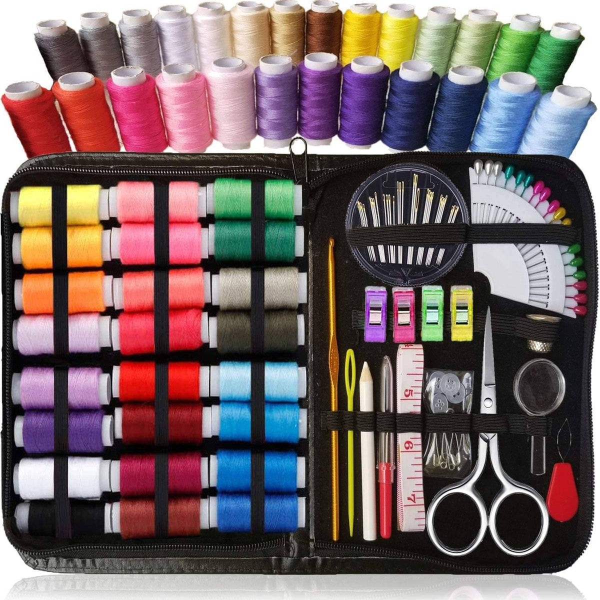 Sewing kit organizer open with multicolor thread spools and assorted tools like scissors and pins