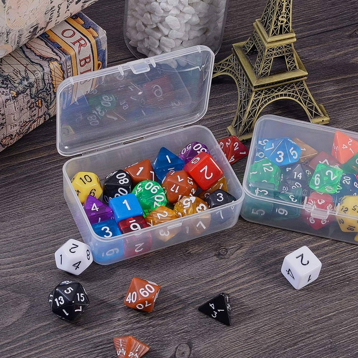 Clear plastic bead storage organizer filled with colorful number dice beads