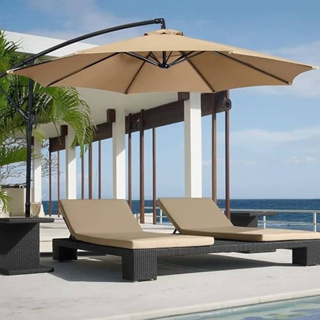 Beige umbrella canopy replacement over lounge chairs near a pool