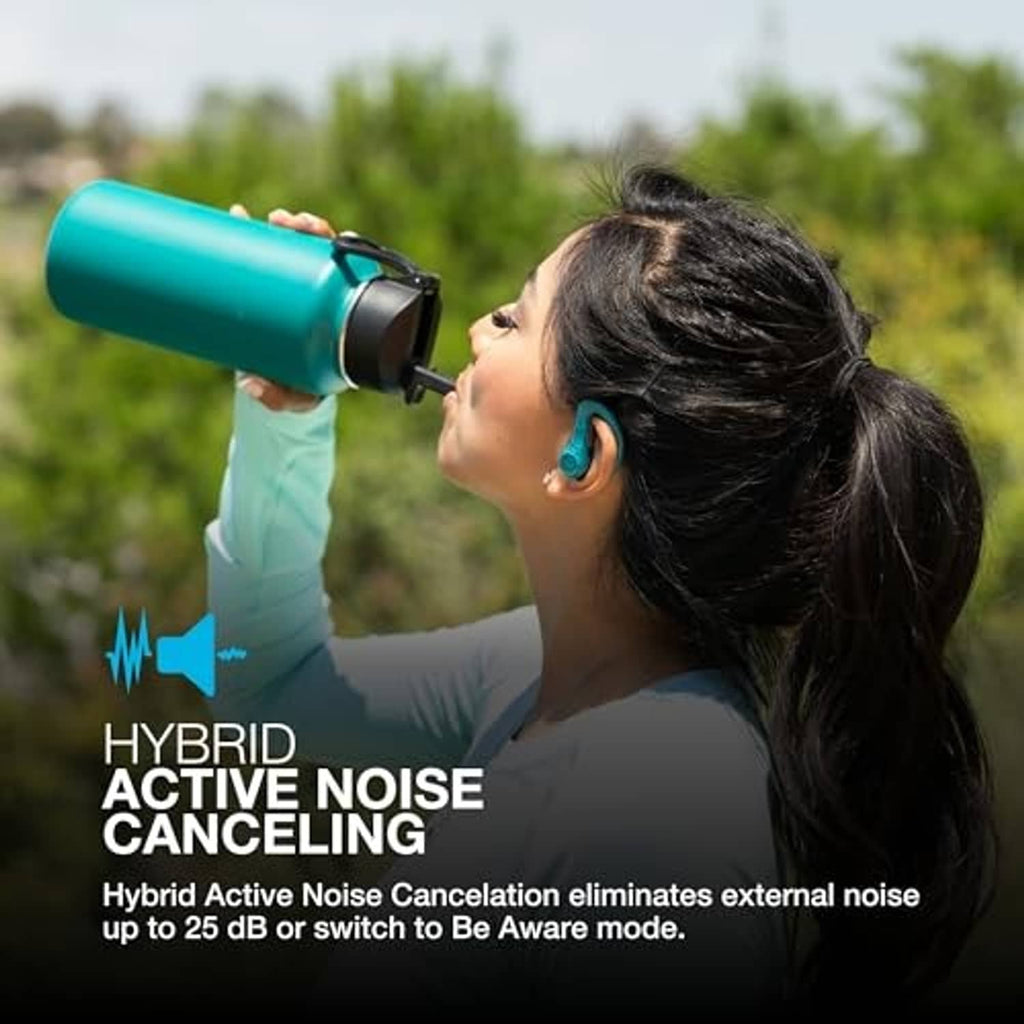 Teal true wireless sport earbuds worn during workout, ear hook visible