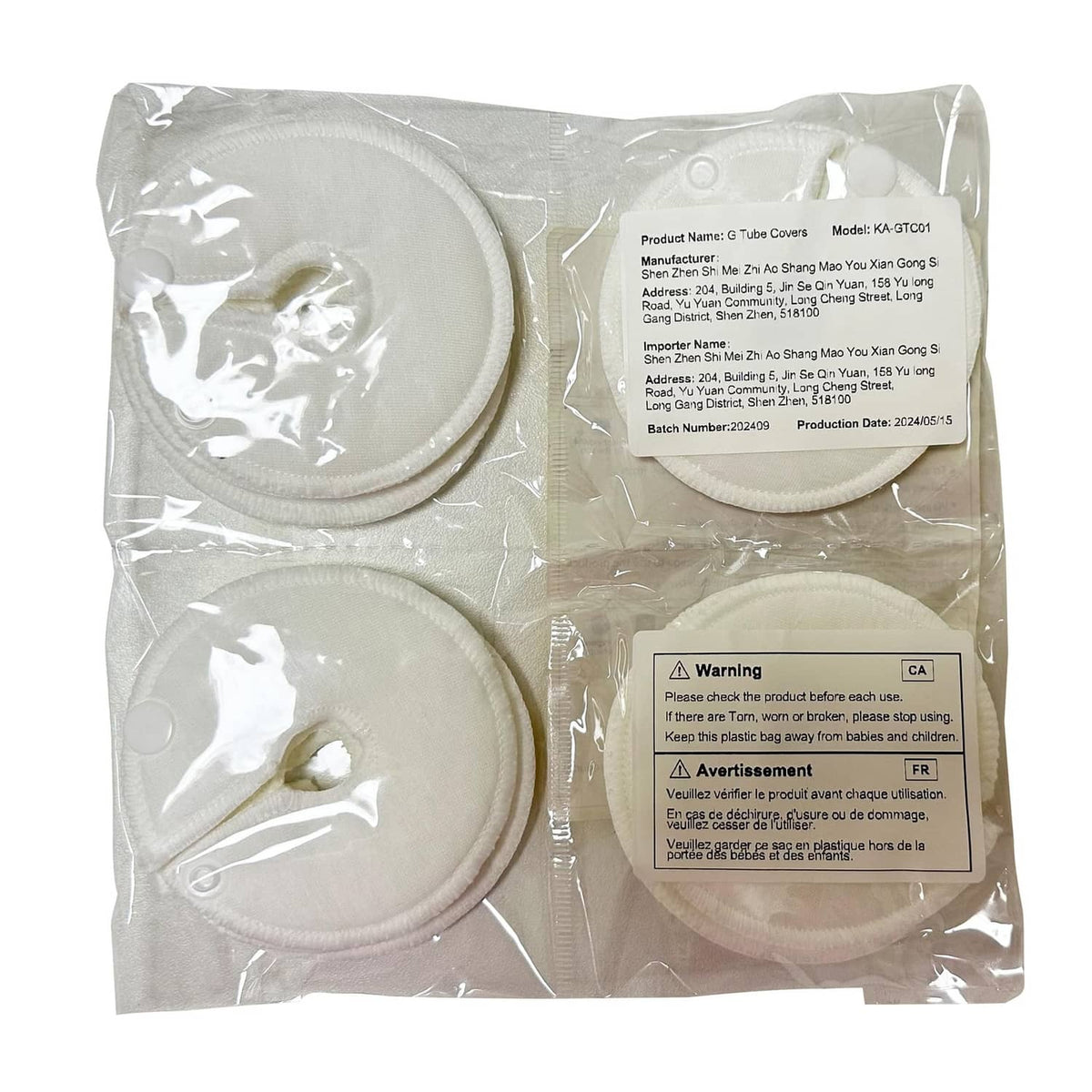 Sealed package of white round button cover pads with fabric backing