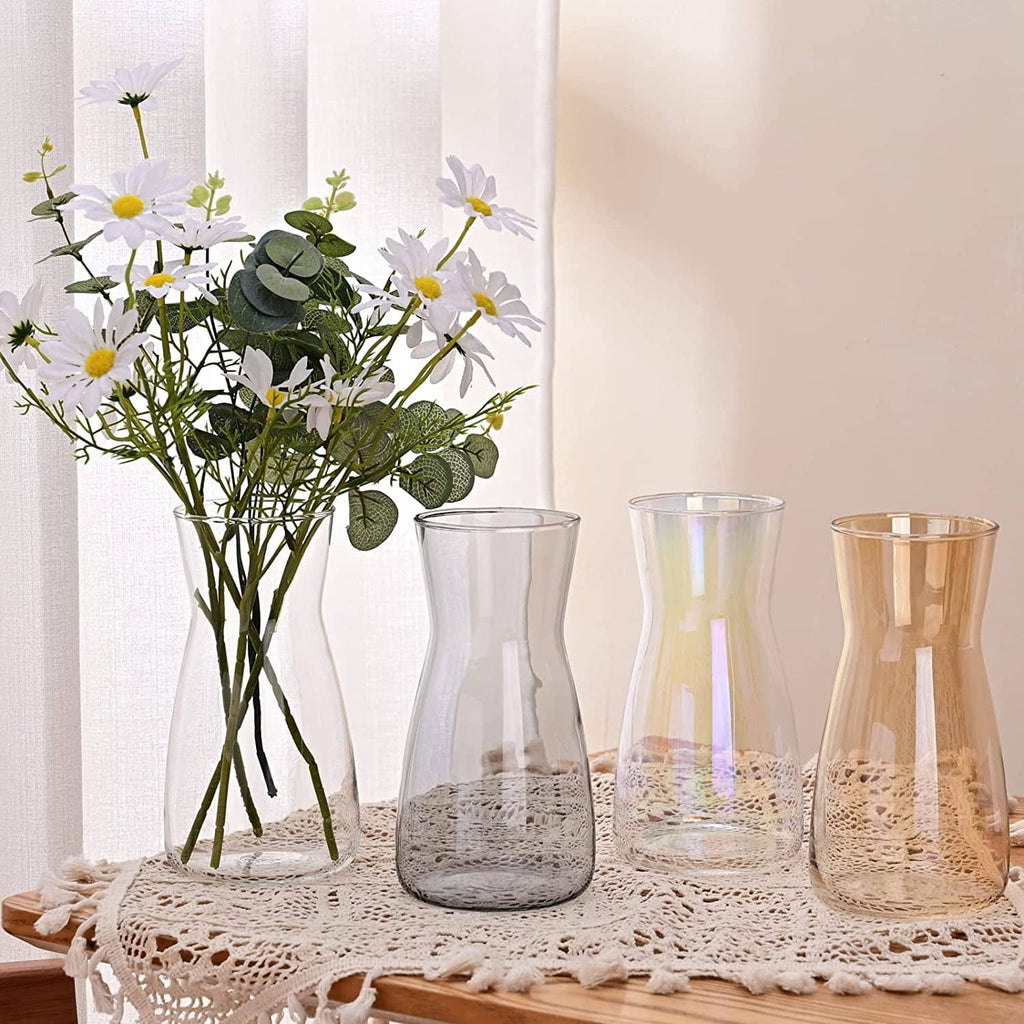 Glass flower vases, clear and iridescent amber tones, assorted shapes for table decor
